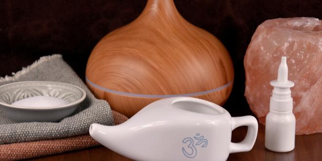 White neti pot in front of aromatherapy device.